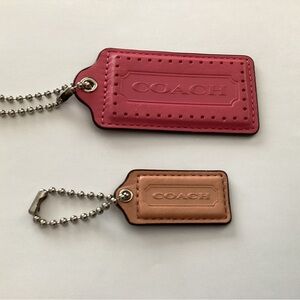 Two (2) Coach tags - one price